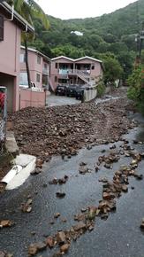 Stones brought by floods in the street (Photo Credit: Latisha Martin, Department of Agriculture, Tortola, BVI)